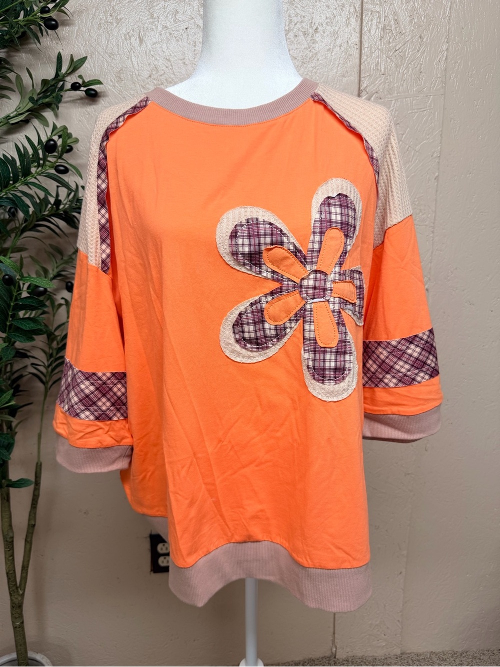 Women’s Orange Floral Appliqué Sweatshirt with Plaid Accents